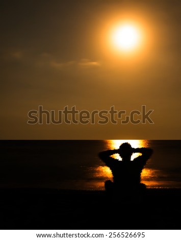 Vertical vivid lonely man staring golden sunset horizon ocean background backdrop