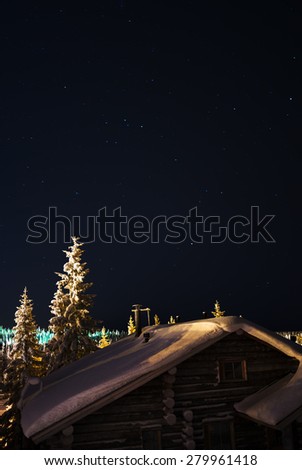 Vertical Finnish house at night with stars background backdrop