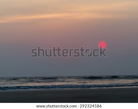 Horizontal vivid ocean toy tidal waves sunset bokeh background backdrop