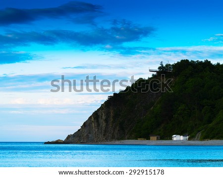 Horizontal vivid hilly ocean beach landscape background backdrop