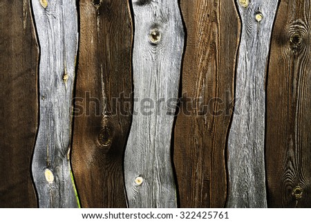 Vertical curved brown boards textured background