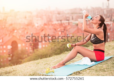 Similar – Image, Stock Photo Woman drinking isotonic drink while resting