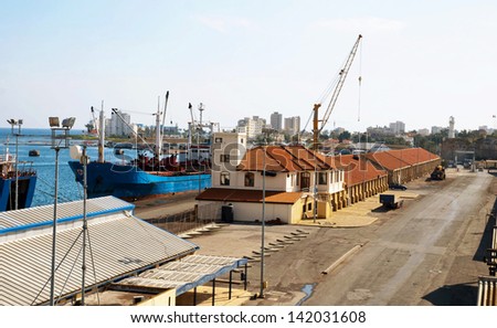 FAMAGUSTA,NORTH CYPRUS -JANUARY 26, 2013:Loading docks of the port in ancient city Famagusta,Cyprus on january 26, 2013