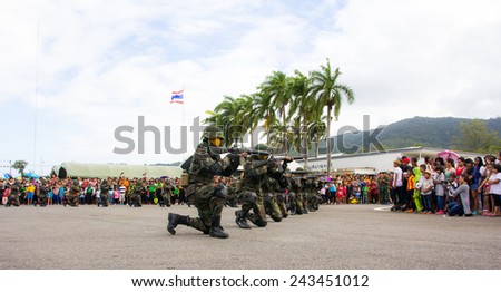 HATYAI THAILAND - JANUARY 10 :Children day, Show soldiers firing guns in the children\'s day at Royal Thai Army on January 10, 2015 in Hatyai Thailand.