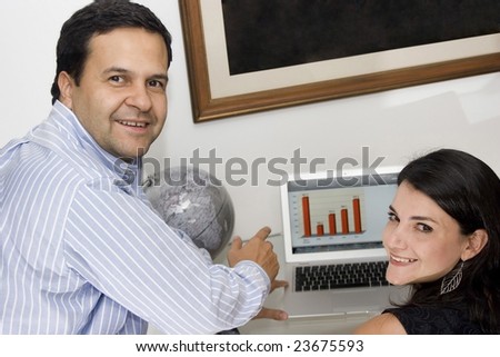 Portrait of a man and woman working at the office