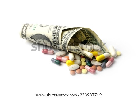 small heap of paper dollars fine and medicines