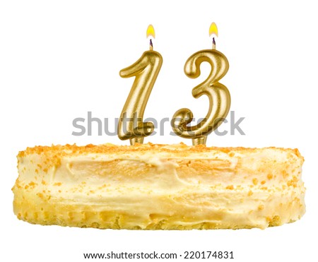birthday cake with candles number thirteen isolated on white background
