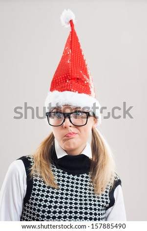 Cute nerd with santa hat is thinking,Nerd thinking