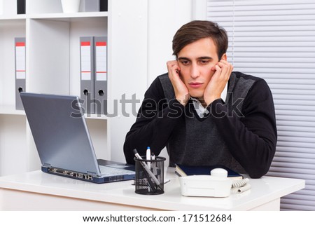 Young businessman got fed up of working,Tired businessman
