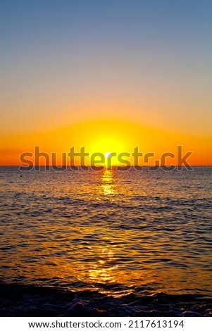 Similar – Image, Stock Photo Scenic sunset over sea and snowy mountains