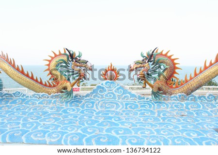 Dragons are mythological creatures in Chinese. Higher animals are close to a deity. Often be found in the religious and sacred place.