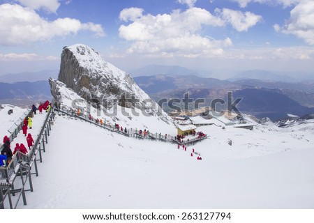 Shangrila - March 19: people walk the Blue moon valley trail on March 19, 2015 in Shangrila, China. Hightest spot of mountain in north of China , trail top of snow