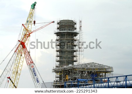 NONTHABURI - August 30: Construction workers natural gas combined cycle power plant building on August 30, 2014 in Nonthaburi, Thailand. The workers were building combined cycle power plant