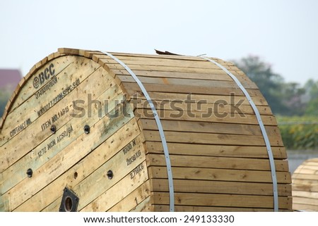 AYUTTHAYA-THAILAND-JANUARY 7 : Old wooden wheel of electrical wire in warehouse on January 7,2015 Bangkok, Thailand