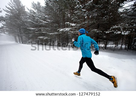 Winter running in a mountain road