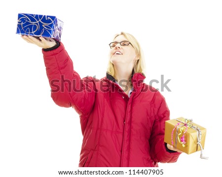 A female person juggling with two colorful gifts