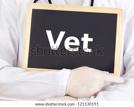 Doctor shows information on blackboard: vet