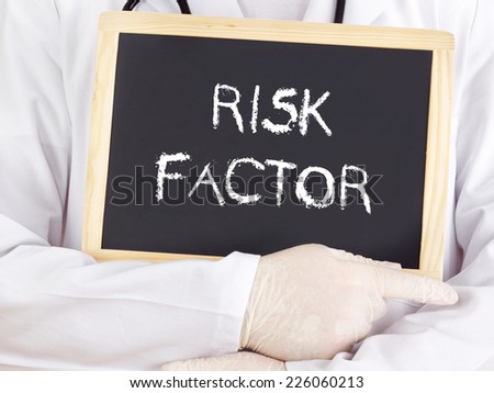 Doctor shows information on blackboard: risk factor