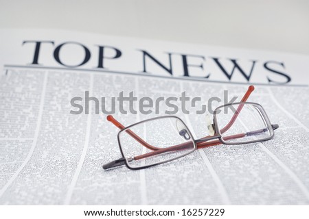 smart glasses on newspaper page