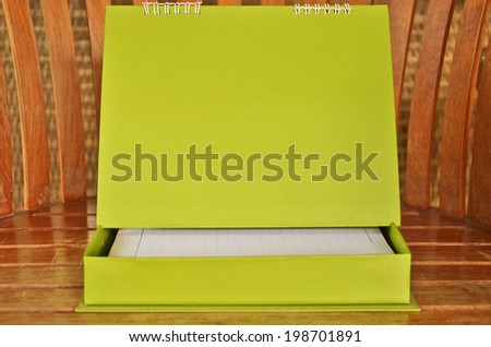 Green paper board and diary box