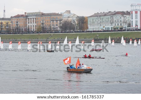 TVER, RUSSIA - OCT 11: Small sailboats in the Olympic torch relay floating on the Volga River on October 11, 2013.