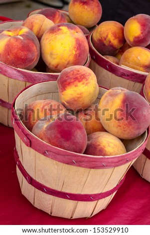 Organically grown yellow peaches for sale at local farmer market