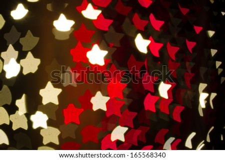 Abstract heart shaped bokeh background of red and white Christmas lights
