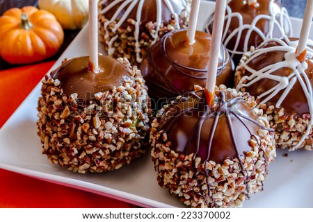 Similar – Image, Stock Photo Chopped pumpkin drizzled with oil for baking