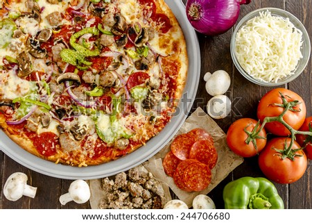 Fresh baked thin crust supreme pizza with fresh mushrooms, onions, green peppers, tomatoes, pepperoni, sausage and cheese