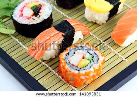 Sushi made from seafood on a bamboo dish,Sushi is a food of Japanese.