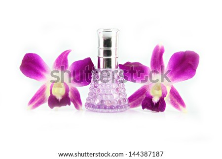 The Purple orchid and  Purple Perfume bottles on the white background.