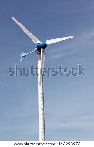 Wind turbines produce electricity for energy and the environment.