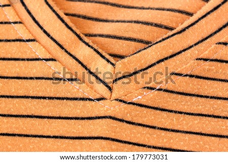 Orange alternating black T-Shirt for background.