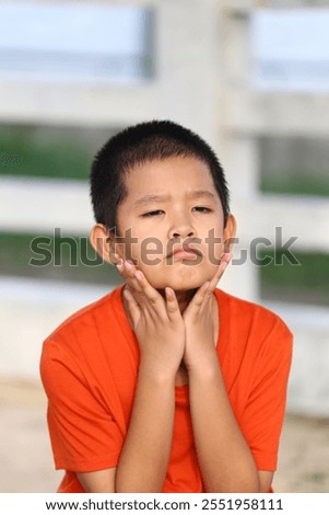 Similar – Image, Stock Photo Peaceful child daydreaming while lying on horse