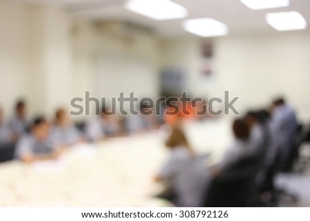 Meeting room in a blur style for the background.