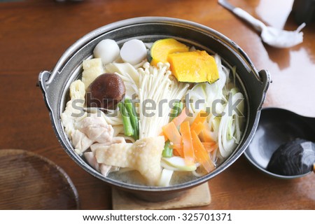 Japanese noodle soup of Udon Ramen (in Japanese cooking) wheat pasta made in thick strips,original local Japan foods.