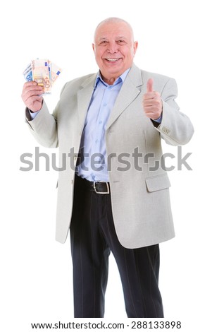 Happy and smile old mature businessman in suit, raised his thumb up and hold euro money in second hand, isolated on white background. Positive human emotion, facial expression
