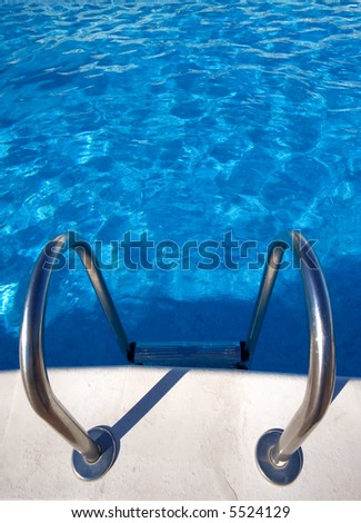 Patches of light on water of pool