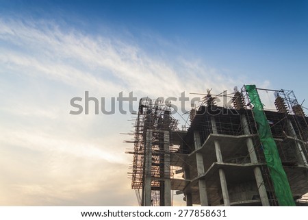 construction site silhouettes on the sunset background
