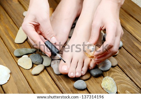 care for beautiful woman legs, Woman hand and feet with manicure , pedicure feet