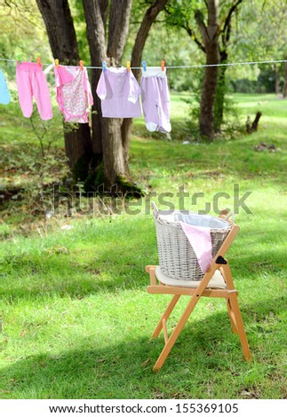 basket of laundry. Drying clothes outdoors