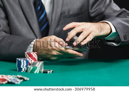 Blackjack Or Poker Game, Casino Worker Shuffling Cards