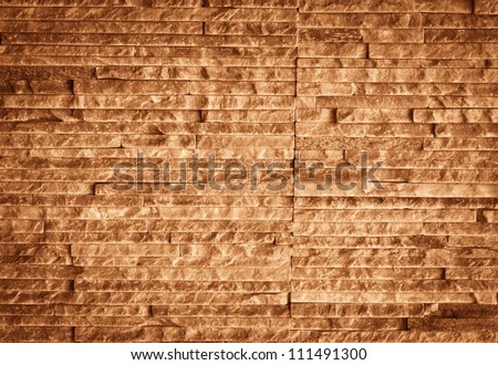 Brown marble set in patterns on the walls