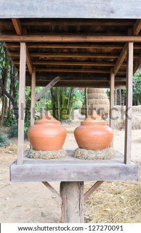 Thai clay jar of water for drink
