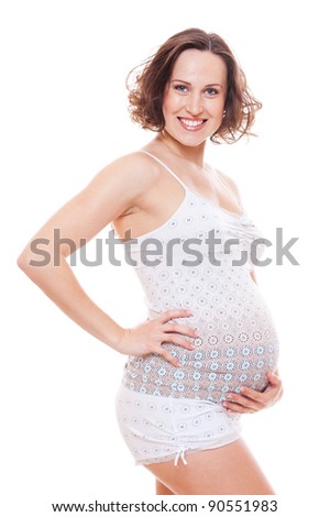 happy pregnant woman hug her belly. isolated on white background
