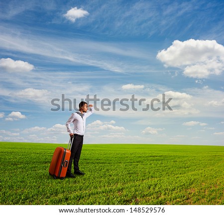 young man holding bag and looking forward
