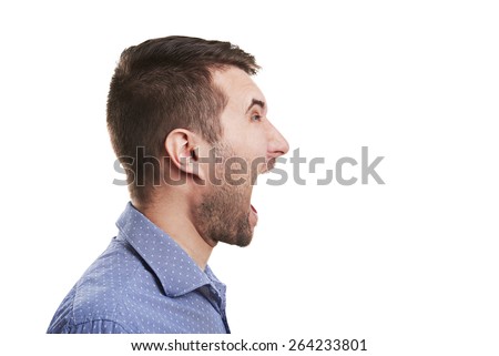 sideview of young man with open mouth. isolated on white background