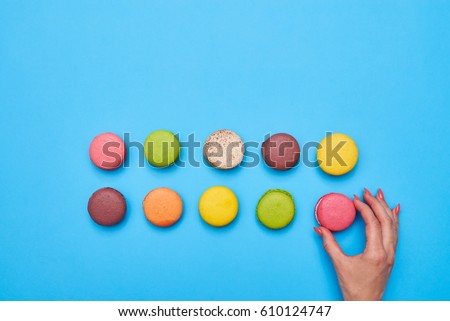 Similar – Image, Stock Photo Crop hand placing macaroons on the table