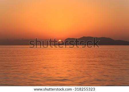 Lovely Sunrise on the sea at Palermo, Italy in Sicily. Dawn at the island. Lovely quiet morning and sea