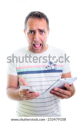 An adult man looks very surprised with something on its electronic devices (smart phone and pad)